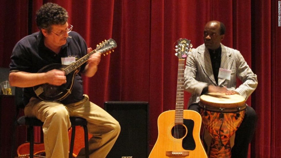 Music therapist Eric Miller performs with David Akombo, assistant professor of music education at Jackson State University, at the conference. Miller also demonstrated how biofeedback can be used in music therapy sessions. 