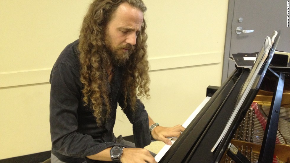 Nacho Arimany improvises on piano at the conference. He&#39;s collaborating with a company called Advanced Brain Technologies to compose music aimed at benefiting the brain. 