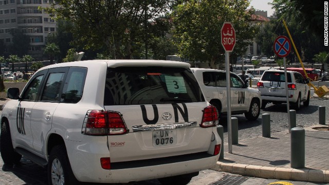 A convoy of United Nations (UN) vehicles leave a hotel in Damascus on August 26, 2013 carrying UN inspectors travelling to the site of a suspected deadly chemical weapon attack the previous week in Ghouta, east of the capital.