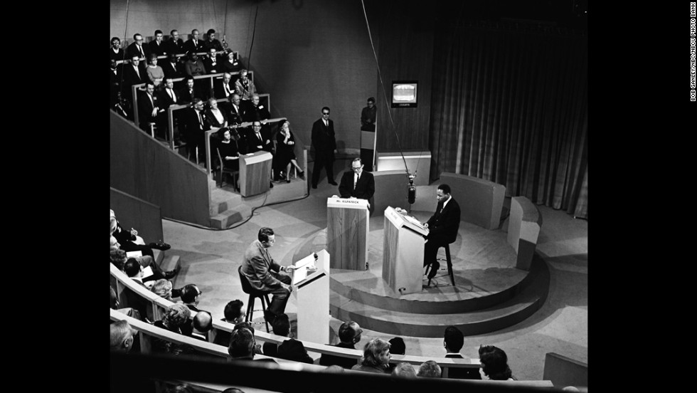 Moderator John McCaffery, left, segregationist editor James J. Kilpatrick and King debate segregation in New York on November 11, 1960.