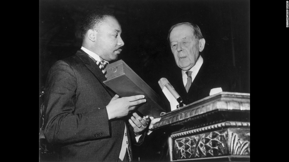 King receives the Nobel Prize for Peace from the president of the Nobel Prize committee, Gunnar Jahn, in Oslo, Norway, on December 10, 1964. At the time he was the youngest person to win the prize. 