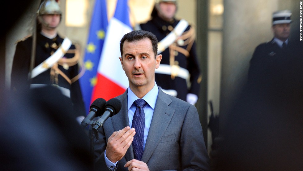 Al-Assad delivers a speech at Elysee Palace in Paris on December 9, 2010, after sharing a working lunch with his French counterpart, Nicolas Sarkozy, during a two-day official visit to France. 