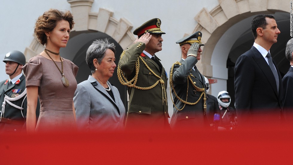 Asma al-Assad, left, appears with her husband and   Austrian President Heinz Fischer and his wife, Margit, during a welcoming ceremonies on April 27, 2009,  durring a two-day state visit to Vienna.