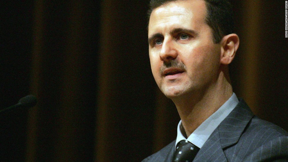 Al-Assad addresses the ruling Baath Party&#39;s 10th congress in Damascus on June 6, 2005.