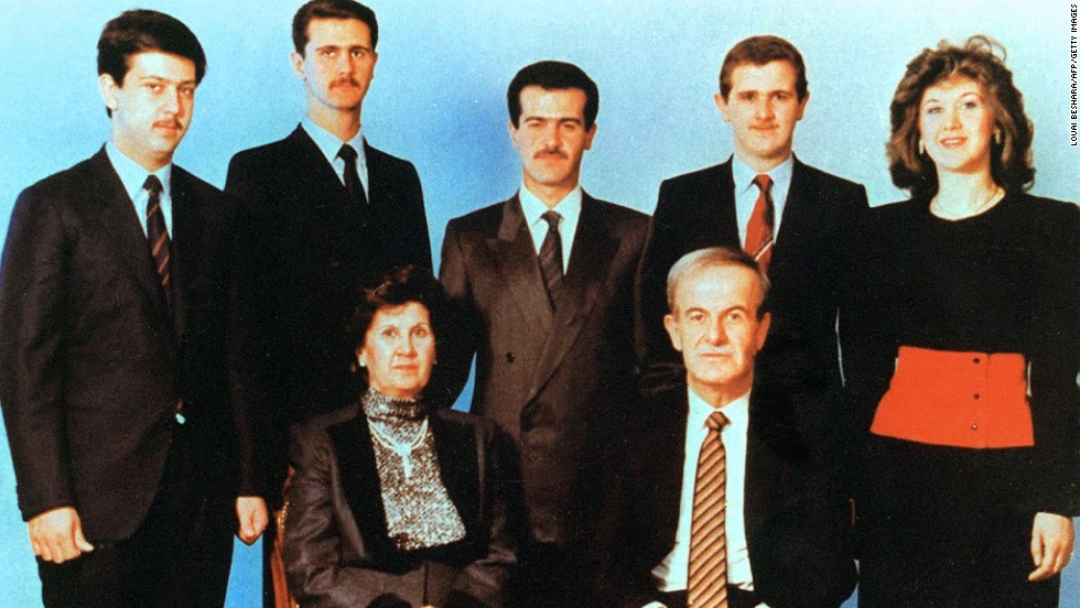 An undated photo shows current Syrian President Bashar al-Assad, second from left, posing with his family.  Al-Assad&#39;s parents, then-President Hafez Assad and his wife, Anisa, in front, and his siblings in the second row; Maher, Bassel, Majd and Bushra.