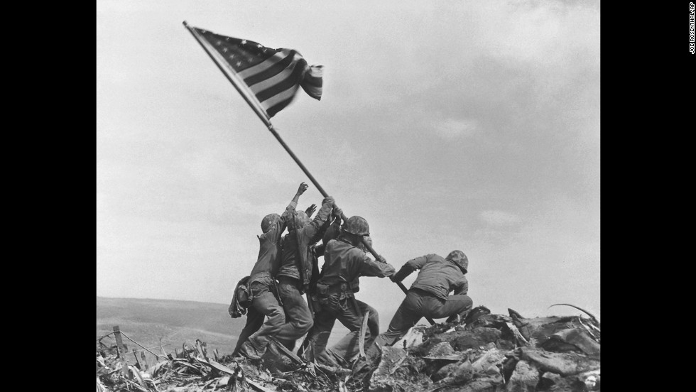 &lt;a href=&quot;http://www.cnn.com/2015/02/22/world/cnnphotos-iwo-jima/index.html&quot;&gt;Joe Rosenthal&#39;s 1945 photograph&lt;/a&gt; of U.S. troops raising a flag in Iwo Jima during World War II remains one of the most widely reproduced images. It earned him a Pulitzer Prize, but he also faced suspicions that he staged the patriotic scene. While it was reported to be a genuine event, it was the second flag-raising of the day atop Mount Suribachi. The first flag, raised hours earlier, was deemed too small to be seen from the base of the mountain.