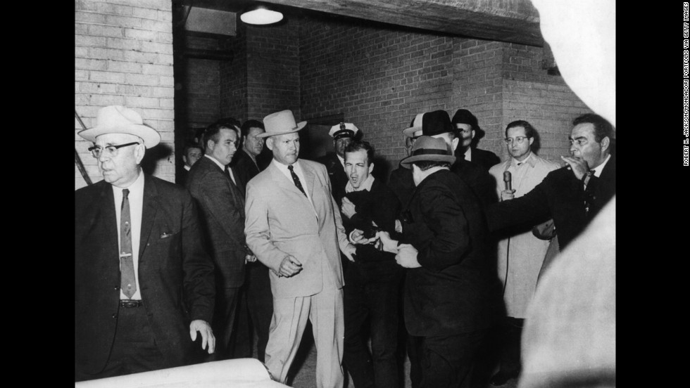 Two days after President John F. Kennedy was killed in 1963, Dallas nightclub owner Jack Ruby gunned down Lee Harvey Oswald, the alleged assassin. Photographer Robert H. Jackson, who covered the event&#39;s surrounding Kennedy&#39;s assassination, instinctively captured the moment and won a Pulitzer Prize. Ruby was later found guilty of murder. He appealed his conviction but died before the start of a new trial.