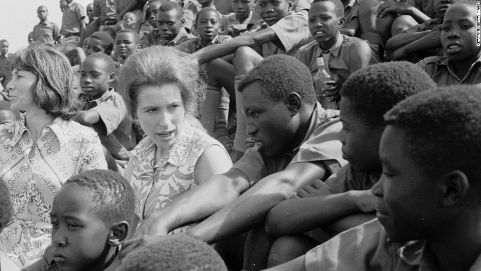 Princess Anne sits with a group of Kenyan orphans as they watch a soccer match at Starehe Boys&#39; Centre in Nairobi, Kenya on February 8, 1971. 