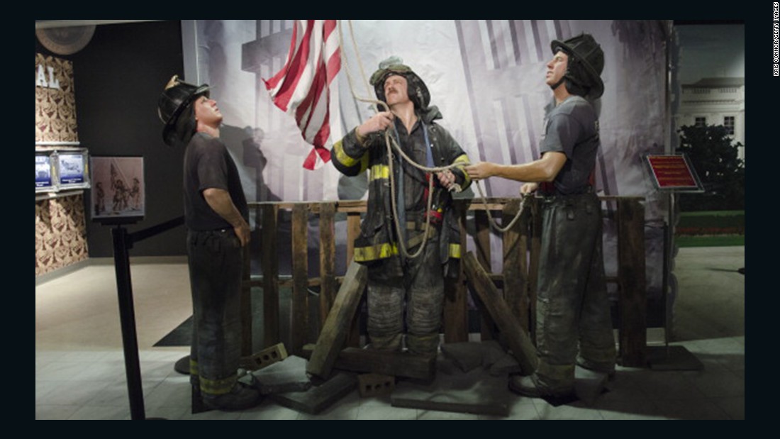 Wax figures of the firefighters are displayed during the &quot;HOPE: Humanity And Heroism&quot; exhibition at Madame Tussauds in Washington on May 10, 2013.