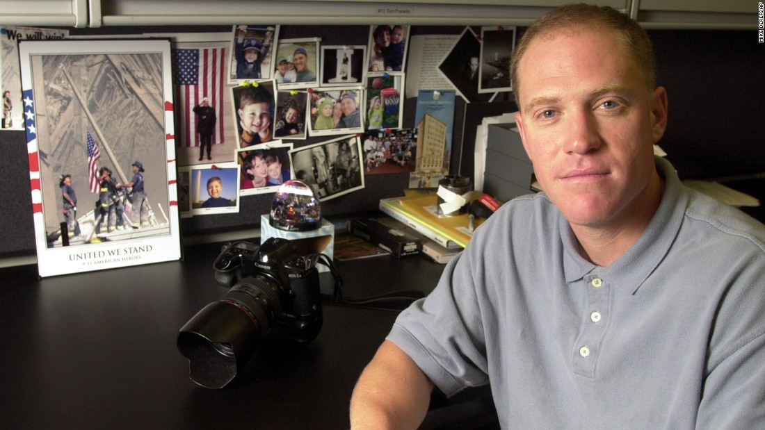 Photographer Thomas E. Franklin sits at his work station in Hackensack, New Jersey, in 2002.