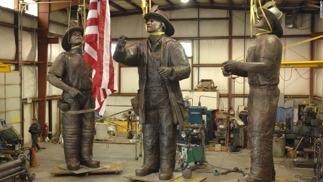 A 40-foot-tall bronze monument named &quot;To Lift a Nation&quot; depicts the famous scene. Pictured at a warehouse in 2007, the sculpture is now part of the permanent collection at the National Fallen Firefighters Memorial Park in Emmitsburg, Maryland.