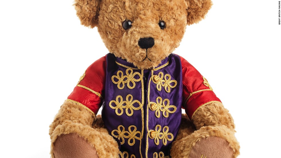 The latest addition to the British royal family, Prince George of Cambridge, was gifted a teddy dressed in the queen&#39;s silks, by a leading horse racing organization.   