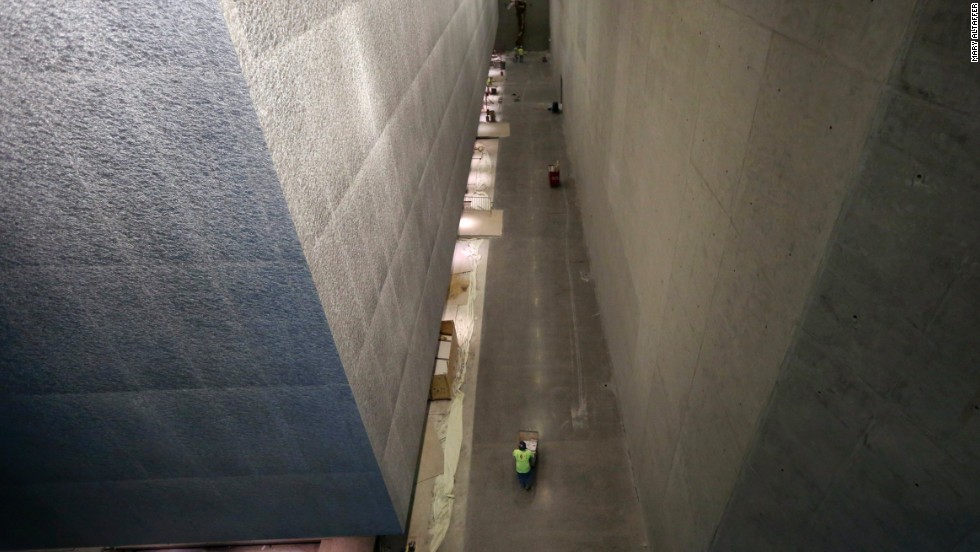 Contractors work to finish construction of the memorial and museum.