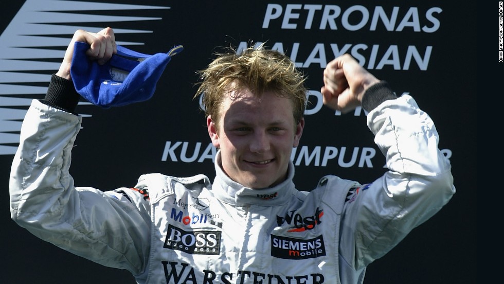 Raikkonen celebrates his maiden grand prix win in Malaysia in 2003. He had moved to McLaren, where he would spend five years, twice finishing as runner-up in the drivers&#39; championship.