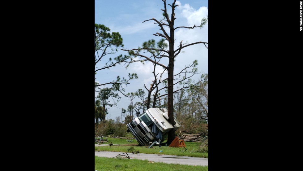 August 13, 2004, Hurricane Charley pushed ashore near Captiva Island, Florida, as a Category 4 storm with maximum winds near 150 mph. It devastated Port Charlotte and Punta Gorda, where a recreational vehicle was found resting against a tree. Charley then moved into the Carolinas to do more damage there. Overall, at least 15 people were killed. Estimated damage: $15 billion.