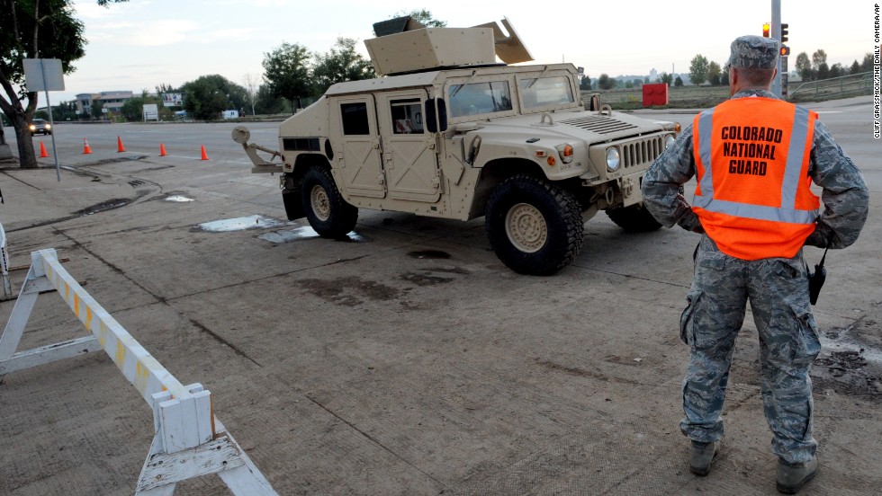 A National Guardsman stands at South Main and Missouri streets in Longmont, Colorado, on September 14. 