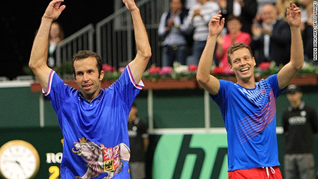 Tomas Berdych (R) and Radek Stepanek (L) celebrate after securing a 3-0 win for the Czech Republic over Argentina in Prague.