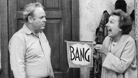 American actors Jean Stapleton and Carroll O'Connor (1924 - 2001), as married couple Edith and Archie Bunker, in a scene from an unidentified episode of the television series 'All in the Family,' Los Angeles, California, 1979. (Photo by CBS Photo Archive/Getty Images) 