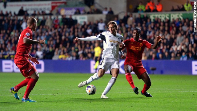 Swansea&#39;s Spanish striker Michu struck a second half equalizer to deny Liverpool victory.