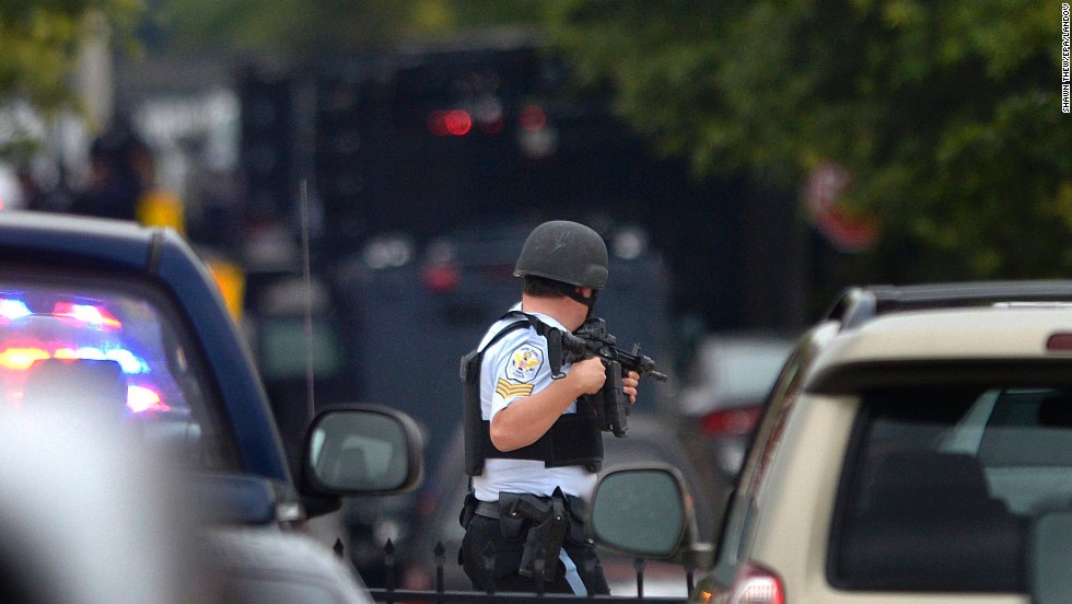 A U.S. Park Police officer stands guard near the scene of the shooting.