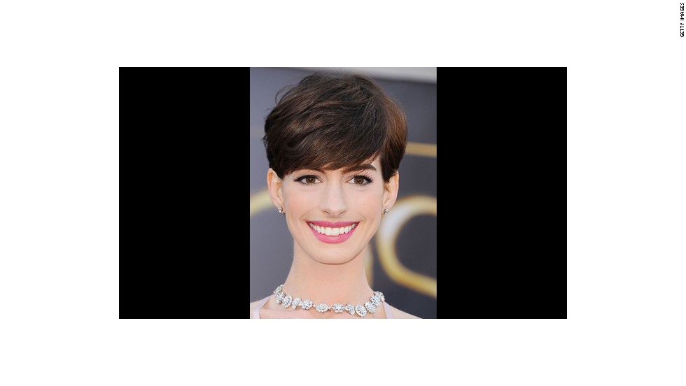 Anne Hathaway&#39;s carnation pink lips and subtly defined eyes are perfect for a daytime wedding says makeup artist Kate Lee.