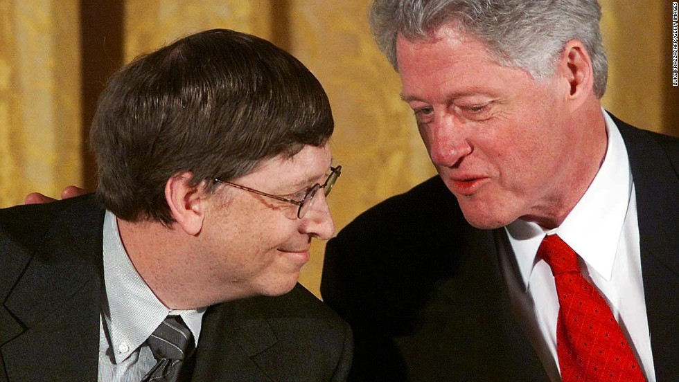 Gates and former U.S. President Bill Clinton attend a White House conference on &quot;the New Economy&quot; in April 2000.