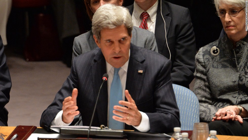U.S. Secretary of State John Kerry said the world community was imposing a binding obligation on the government of Syrian President Bashar al-Assad to get rid of its chemical weapons stockpile.