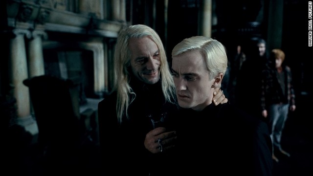 Jason Isaacs and Tom Felton as father-and-son bad guys Lucius and Draco Malfoy in the movie adaptation of Harry Potter and the Deathly Hallows.