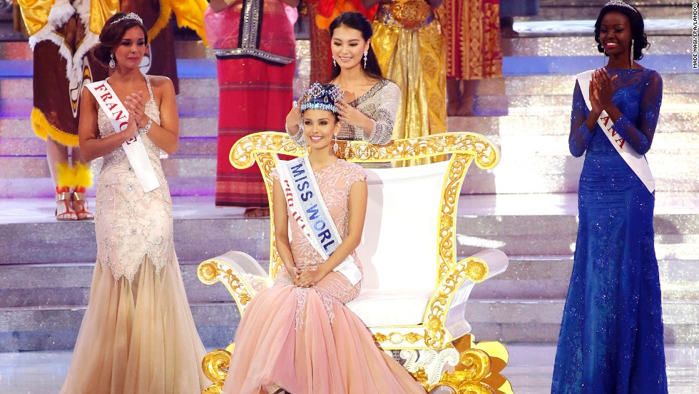 Miss World 2012, Yu Wenxia crowns Megan Young of the Philippines as the new Miss World during the grand finale of the Miss World 2013 beauty pageant held at Bali Nusa Dua in Bali, Indonesia, on Saturday, September 28. &quot;No words! Thank you so much for everyone for choosing me,&quot; said Young. &quot;I promise to be the best Miss World ever.&quot; Miss France Marine Lorphelin, left, took second and Miss Ghana Carranzar Naa Okailey Shooter, took third. 