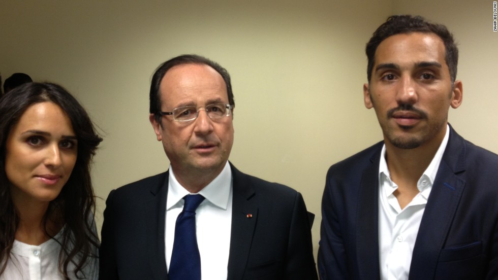 Belounis (right) held talks with French President Francois Hollande in June and claims he had been told he would receive his exit visa on October 21 -- it came more than a month later.