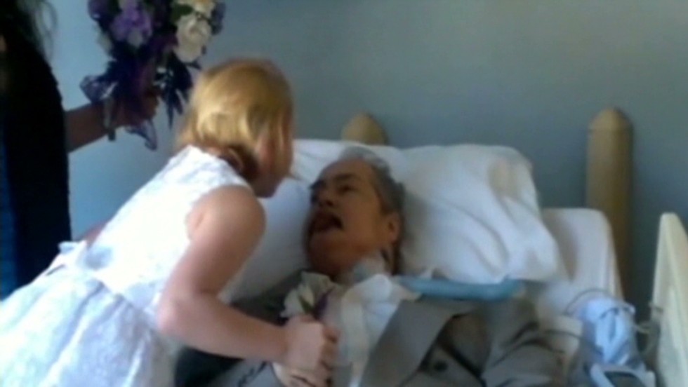 A father gives his 10-year-old daughter his blessing from his hospital bed ...