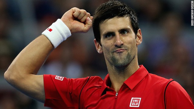 Serbian tennis star Novak Djokovic celebrates after beating Rafael Nadal in the China Open men&#39;s final in Beijing.