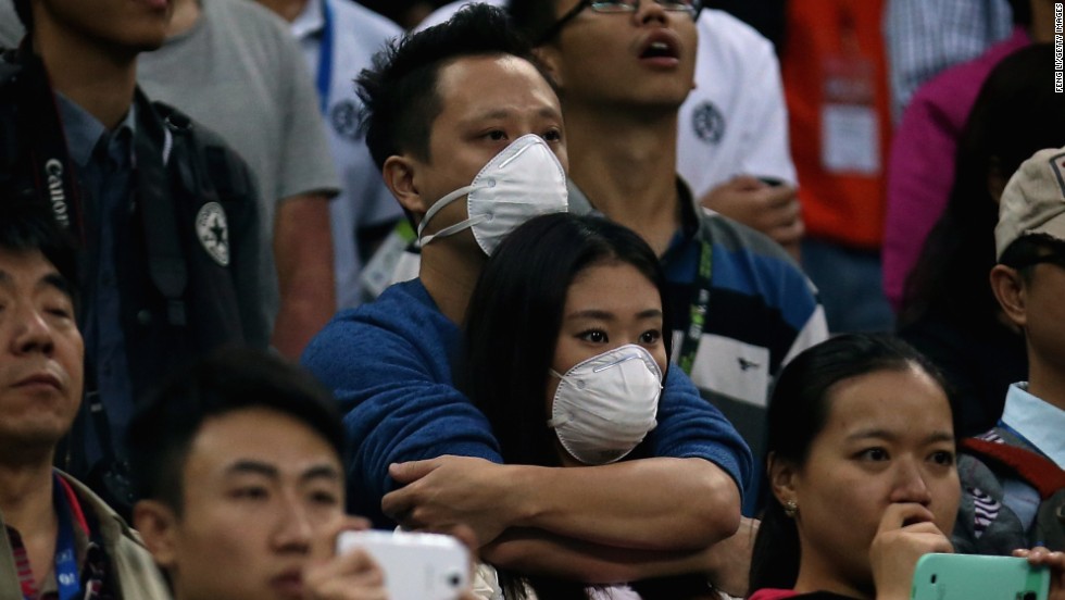Masks were seen in the crowd Sunday also. This couple were spotted watching Novak Djokovic down Rafael Nadal in the men&#39;s final.