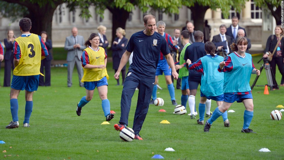 Prince William shows off his footballing skills during a training session on the grounds of Buckingham Palace.