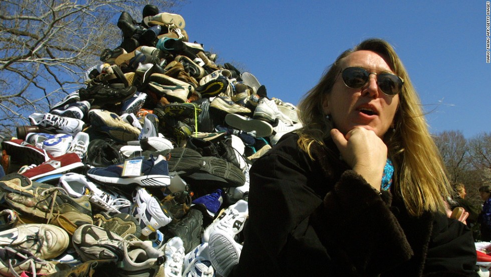 Jody Williams sits in front of donated shoes symbolizing landmine victims during Ban Landmines Week on March 8, 2001, on Capitol Hill in Washington. Williams and the International Campaign to Ban Landmines won the Nobel Peace Prize in 1997.  