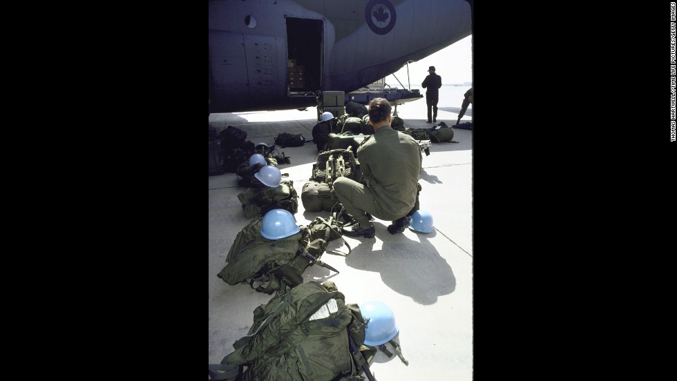 U.N. soldiers unload their gear from a C-130 cargo plane as the U.N. observer team policing the Iran-Iraq ceasefire arrives in Baghdad. The United Nations Peacekeeping Forces won the Nobel Peace Prize in 1988. 