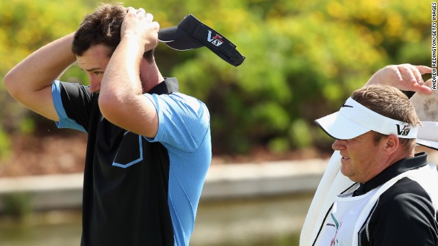 Scott Jamieson, left, reacts after he missed out on shooting a 59 at the Portugal Masters. 