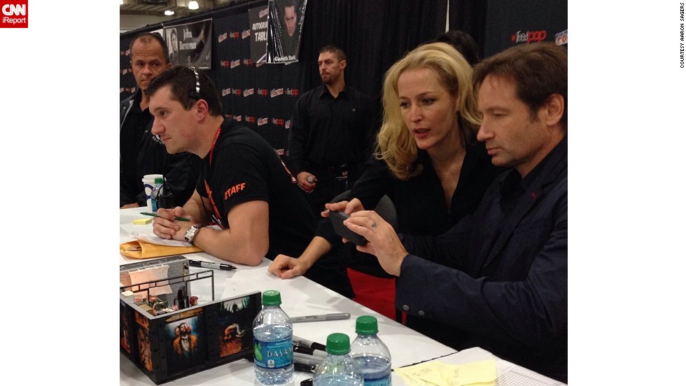 &quot;X-Files&quot; stars Gillian Anderson and David Duchovny -- here taking a photo of a fan&#39;s diorama -- &lt;a href=&quot;http://t.co/1dMT9oa3iu&quot; target=&quot;_blank&quot;&gt;reunited&lt;/a&gt; for the show&#39;s 20th anniversary.