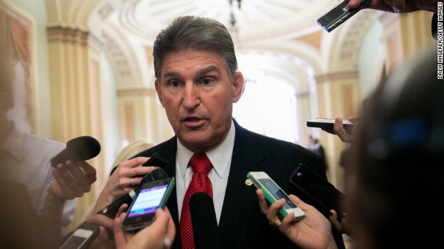 WASHINGTON, DC - SEPTEMBER 17: Sen. Joe Manchin (D-WV) talks to reporters before heading to a Senate Democratic policy luncheon, on Capitol Hill, September 17, 2013 in Washington, DC. Manchin discussed gun control issues with reporters in light of the Navy Yard shootings in Washington yesterday.  (Photo by Drew Angerer/Getty Images)