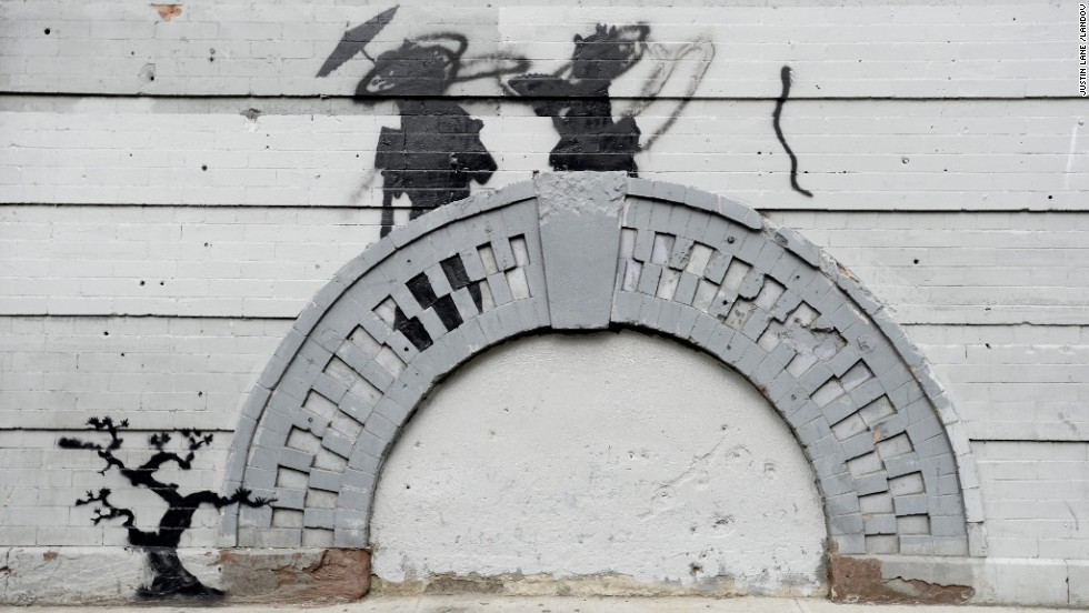 Banksy work in the Williamsburg neighborhood of Brooklyn, New York, was vandalized in broad daylight in October 2013.