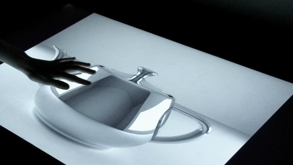 For example, TeslaTouch could let you run your fingers across a screen and feel the texture of a picture of a teapot. 