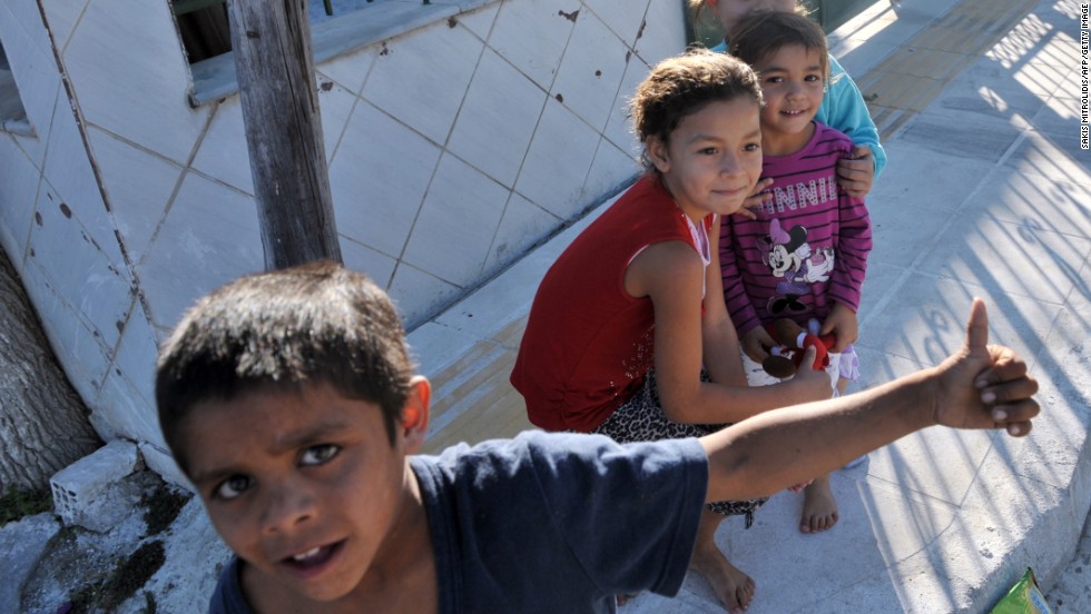 Children play in a Roma settlement in Farsala, Greece, where the &lt;a href=&quot;http://www.cnn.com/2013/10/21/world/europe/greece-mystery-girl/index.html?hpt=hp_t1&quot;&gt;&#39;Mystery Girl&#39; was found&lt;/a&gt; on Saturday, October 19. The case has generated huge interest in Greece.