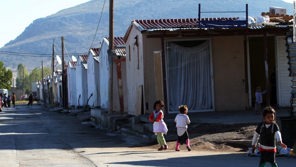 Roma children play next to a Roma settlement in Farsala, Greece, on Saturday, October 19. Haralambos Dimitriou, head of the local Roma community, said Dimopoulou and Salis raised Maria like a &quot;normal&quot; child.