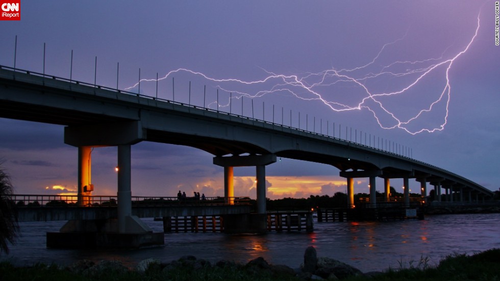 The lightning&#39;s quick movement and the way it contrasted with the colors of the sunset caught Billy Ocker&#39;s eye in &lt;a href=&quot;http://ireport.cnn.com/docs/DOC-1008938&quot;&gt;his photo&lt;/a&gt; from Florida&#39;s Sebastian Inlet on July 21.