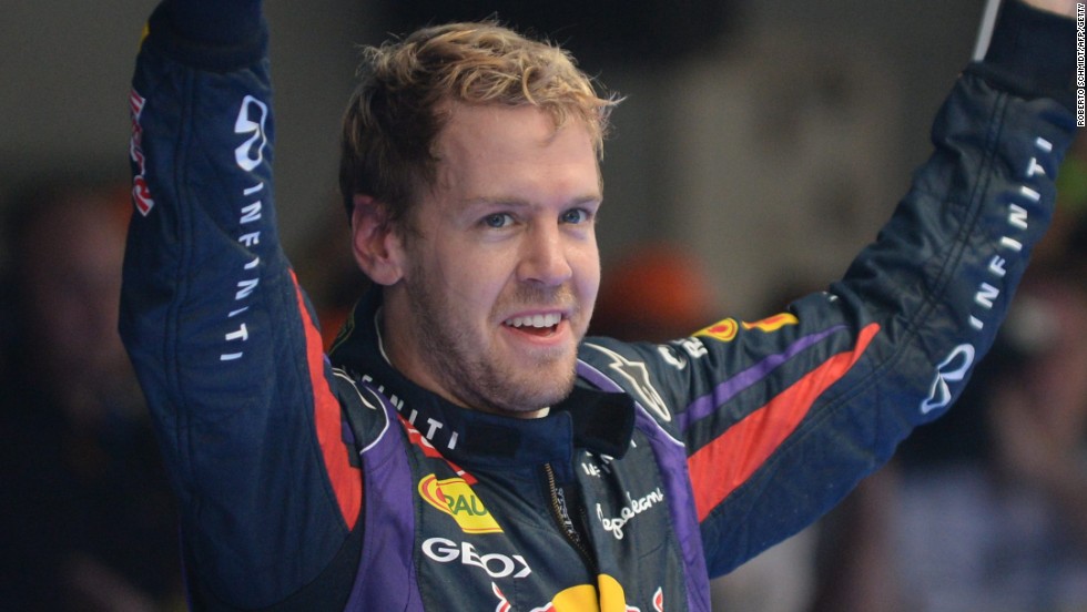 Sebastian Vettel celebrates victory at the Indian Grand Prix in October. The win clinched a fourth straight F1 world title.