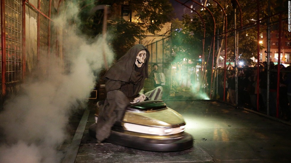 Banksy&#39;s art exhibit &quot;Grim Reaper Bumper Car&quot; sits on New York&#39;s Lower East Side in October 2013. The famously anonymous artist, whose paintings regularly go for six figures at auction houses around the world, said he was on a &quot;residency on the streets of New York.&quot;