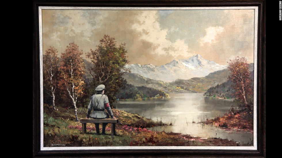 &quot;The Banality of the Banality of Evil&quot; actually started out as a thrift store painting in New York City. Once altered by Banksy, who inserted an image of a Nazi officer sitting on a bench, it was re-donated to the store in October 2013, according to the&lt;a href=&quot;http://www.banksyny.com/&quot; target=&quot;_blank&quot;&gt; artist&#39;s site&lt;/a&gt;.