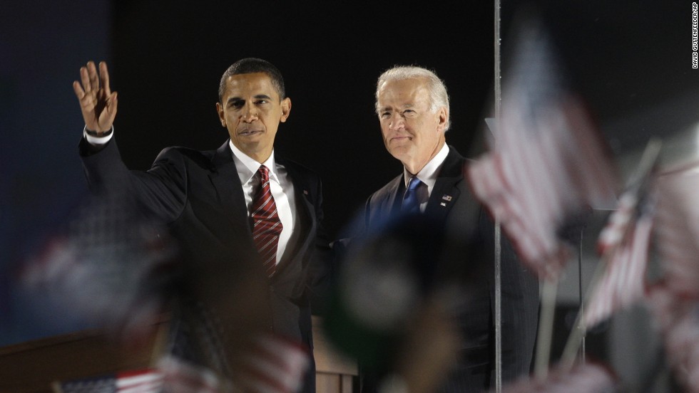 Biden and President-elect Barack Obama wave to the crowd at their election night party at Grant Park in Chicago on November 4, 2008.