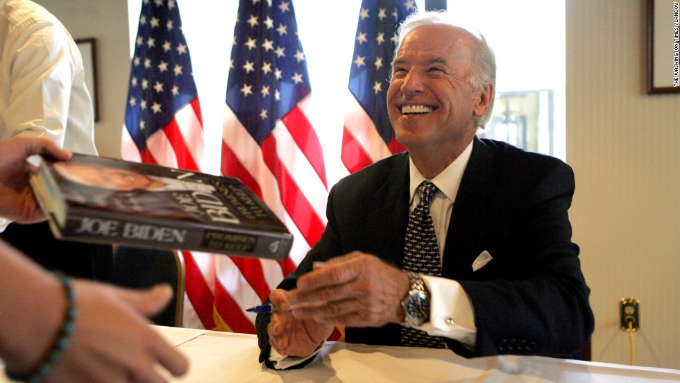 Biden signs his book &quot;Promises to Keep&quot; at the National Press Club in Washington, DC, in 2007.