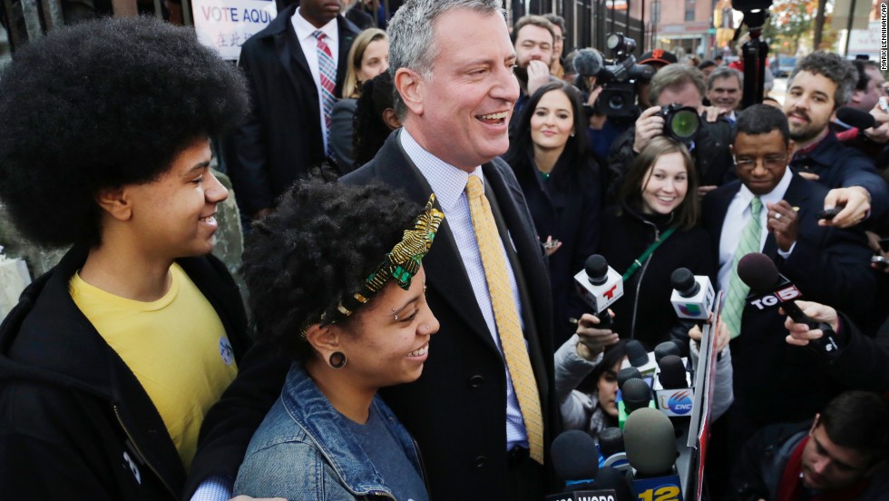 Democratic mayoral candidate Bill de Blasio appears with his children, Dante and Chiara, as he talks to the media after voting in the Park Slope neighborhood of Brooklyn on Tuesday, November 5. De Blasio defeated Republican Joe Lhota by a 73%-24% margin with 91% of the vote in, making him the first Democrat to lead the nation&#39;s largest city in a generation.